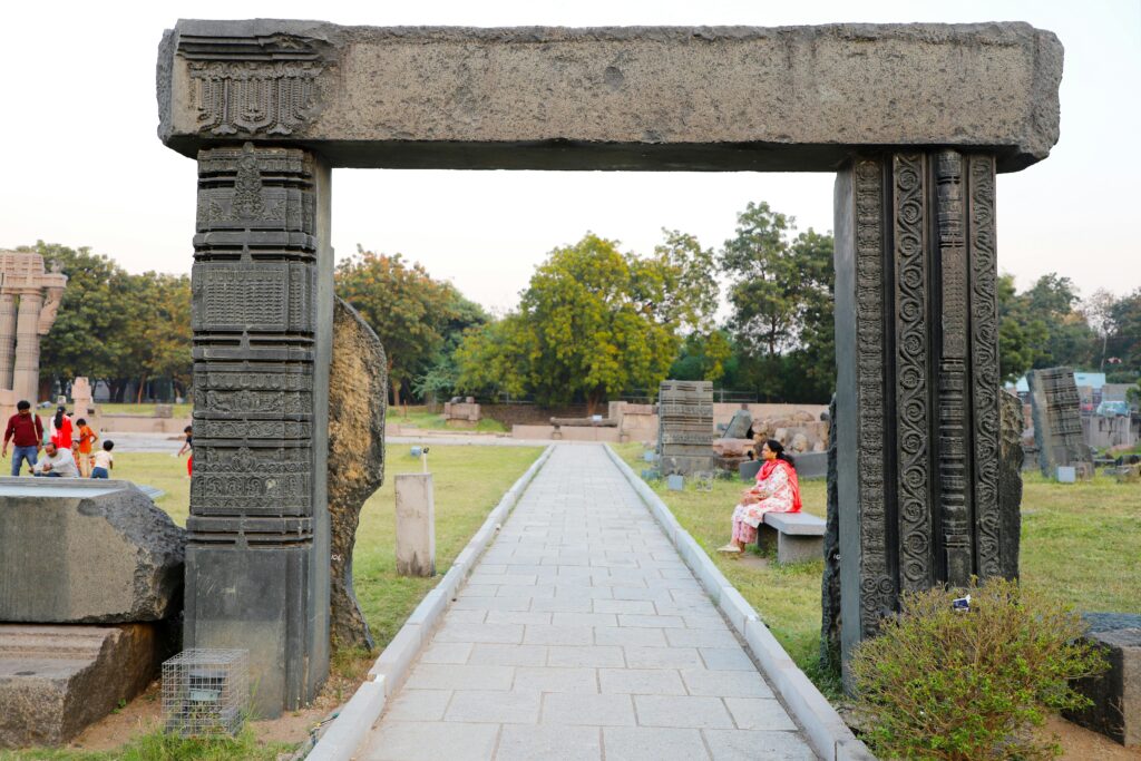  Mehrauli Archaeological Park visitors walking and exploring heritage structures in Delhi