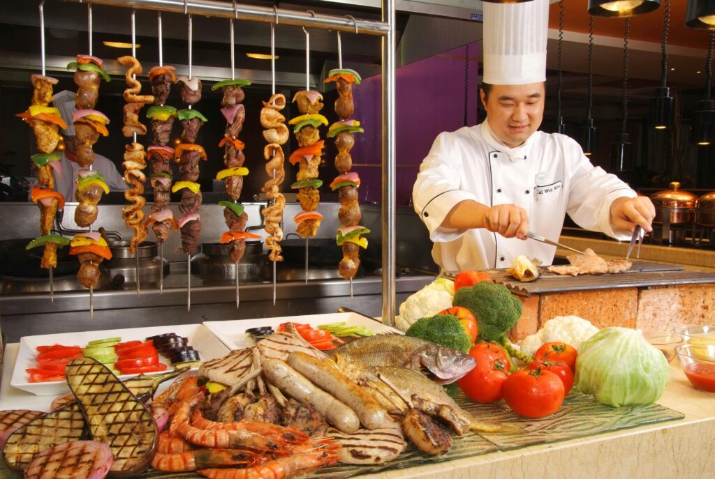  Live grill and buffet spread at Pirates of Grill, a vibrant restaurant in Delhi for groups