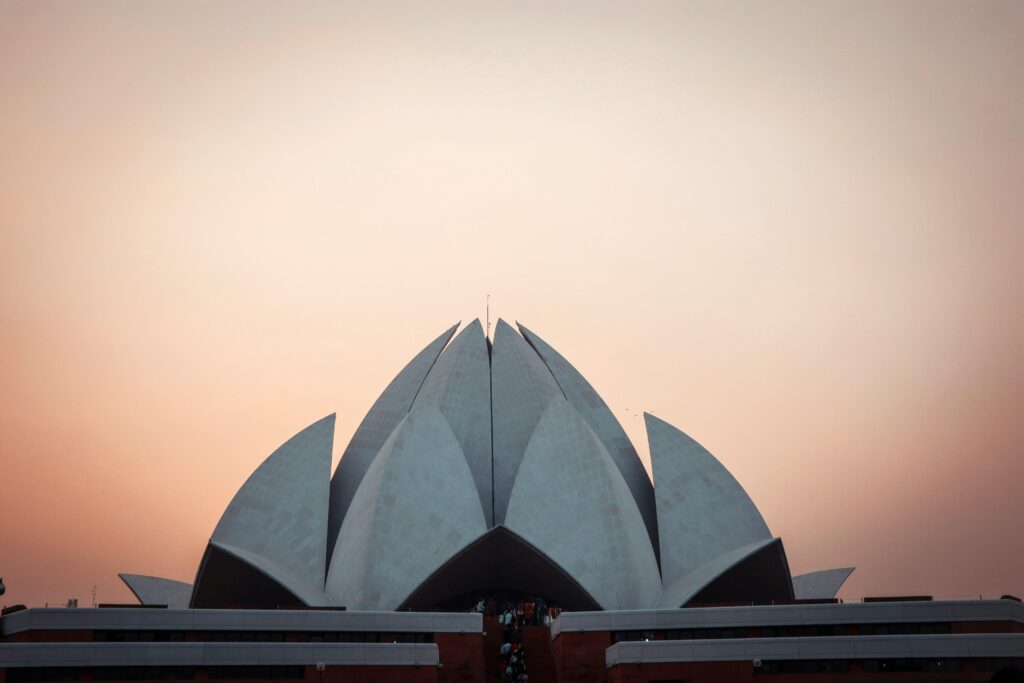  Lotus Temple Showing tourists taking photos of the temple exterior in Delhi